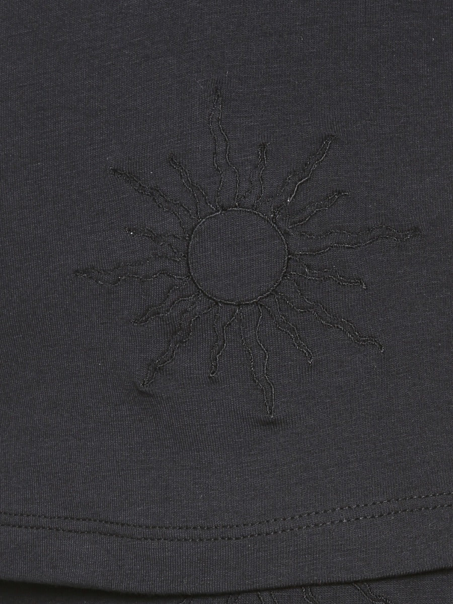 Leggings neri realizzati artigianalmente in Italia con fascia in vita e ricamo sole